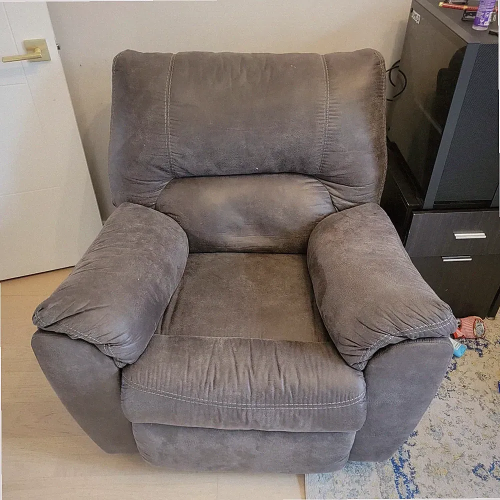Ashley Tambo Faux Leather Manual Rocker Recliner